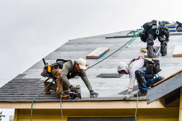 Professional Gutter Installation technician working in Solomon, KS